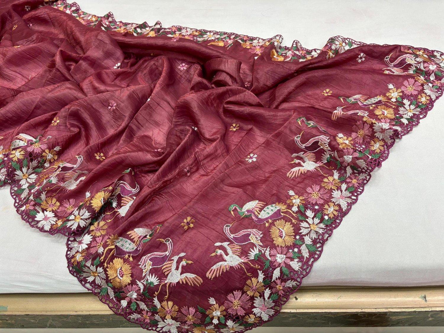 A Pure Crush Silk Saree Typically Has A Soft, Textured Appearance Due To The Crushed Fabric Technique